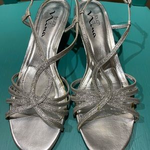 Silver sparkly sandals by Nina
